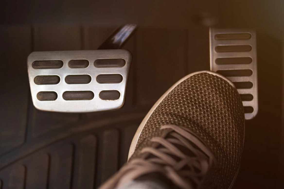 brake pedal and accelerator pedal being pressed